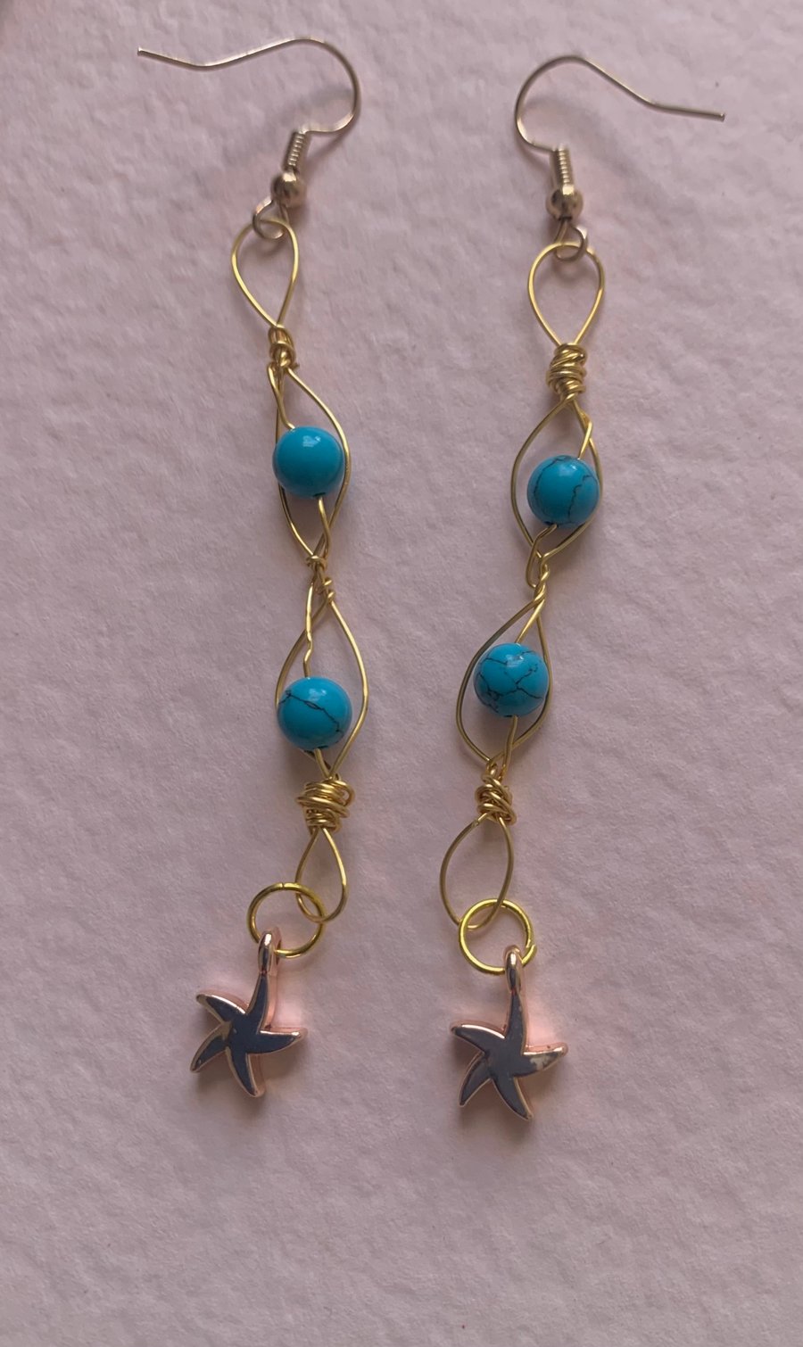 Beautiful turquoise agate wrapped earrings. Rose gold and gold. Unique gift