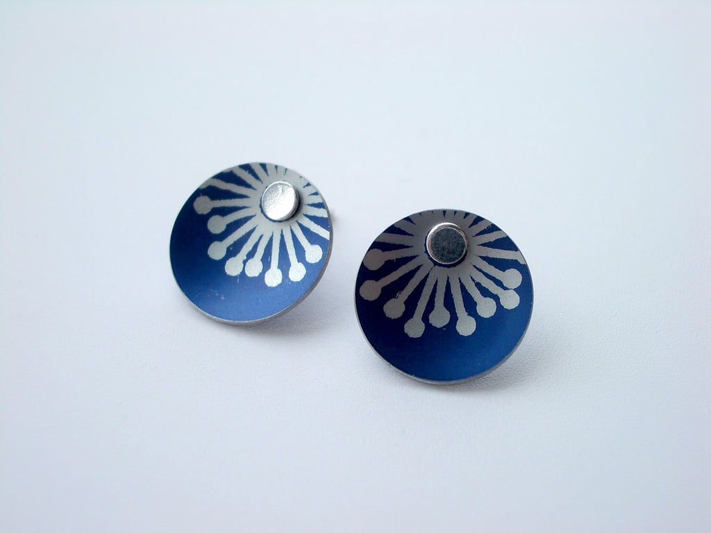Dark blue starburst studs earrings