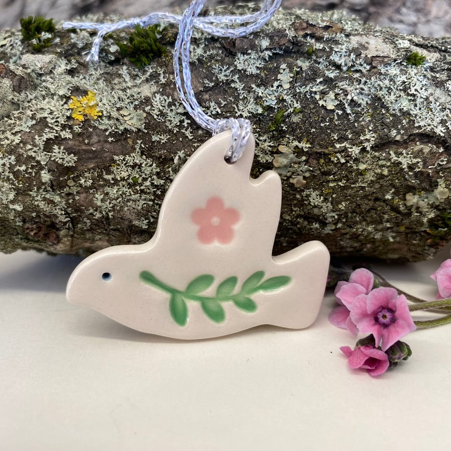Teeny ceramic dove decoration with leaves and pink flower