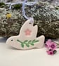 Teeny ceramic dove decoration with leaves and pink flower
