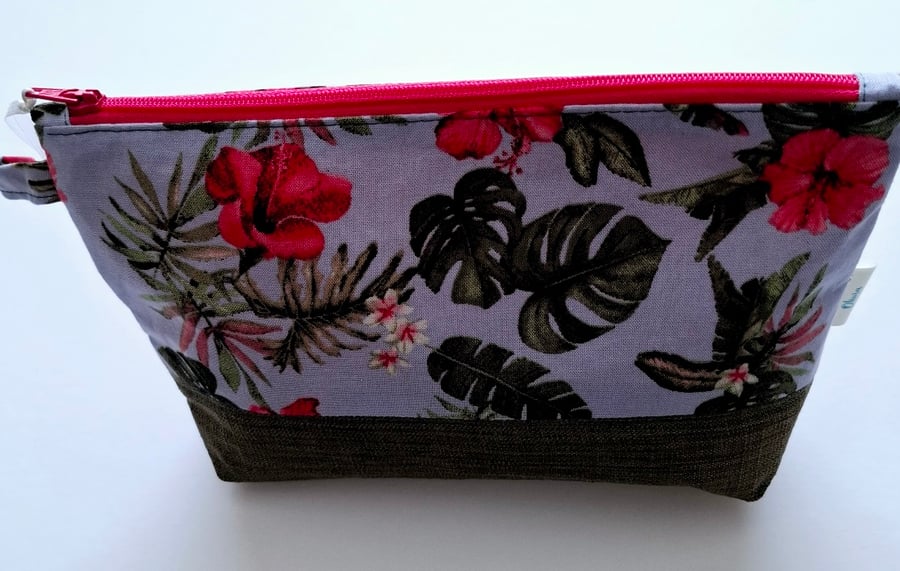 Pink and green cosmetic pouch