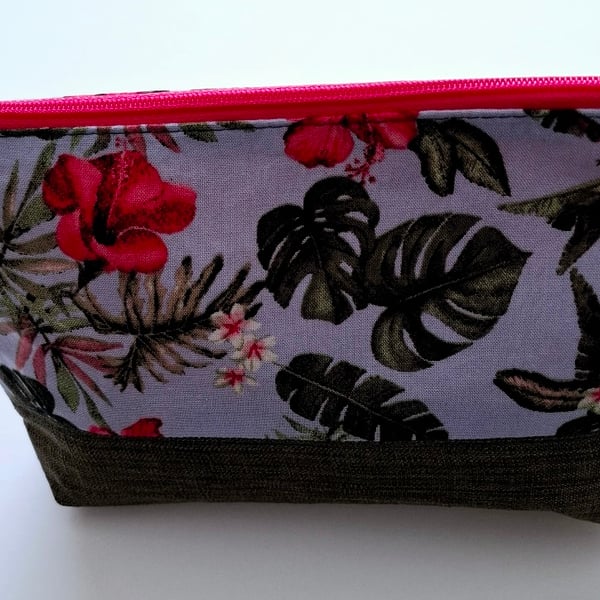 Pink and green cosmetic pouch