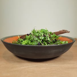 LARGE LOW BURNT ORANGE CERAMIC BOWL - with a charcoal glaze on the outside