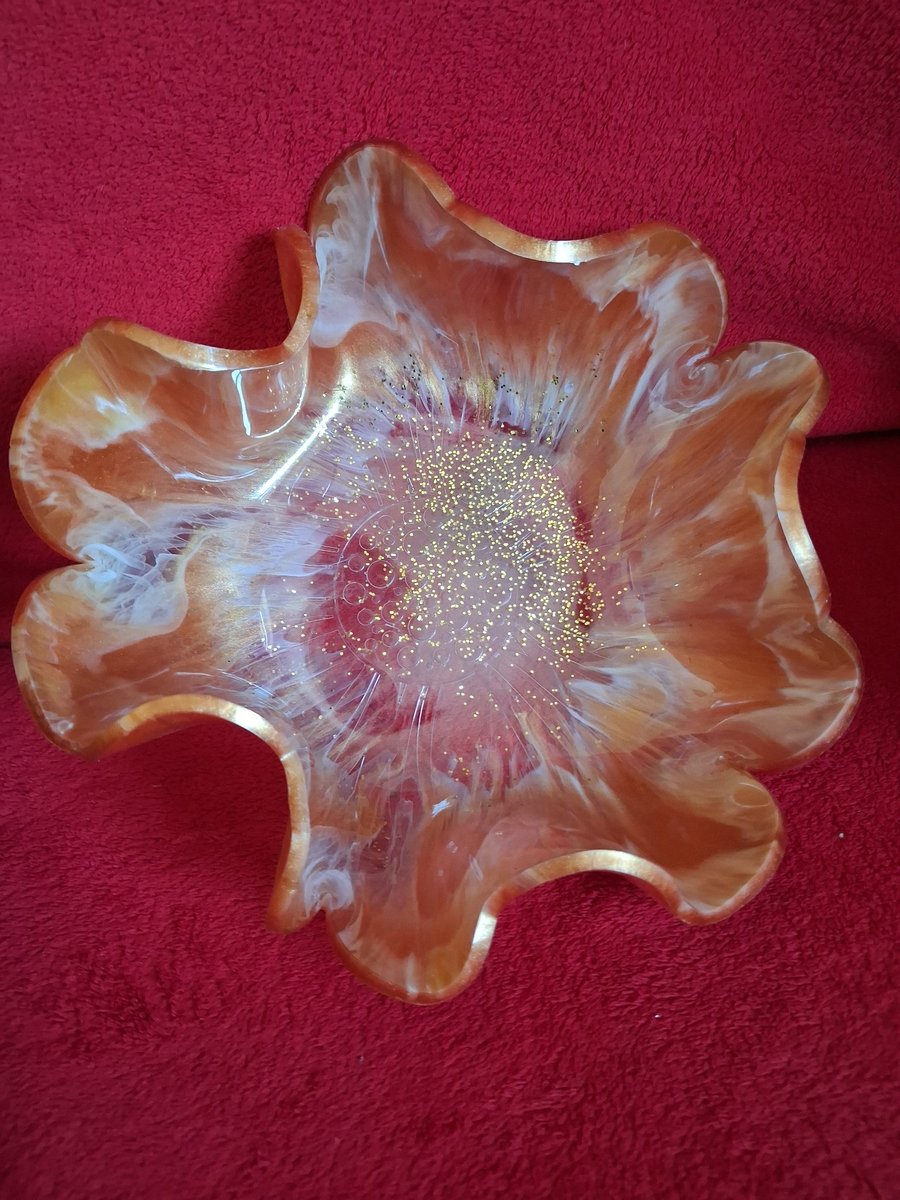Handmade epoxy resin decorative bowl.