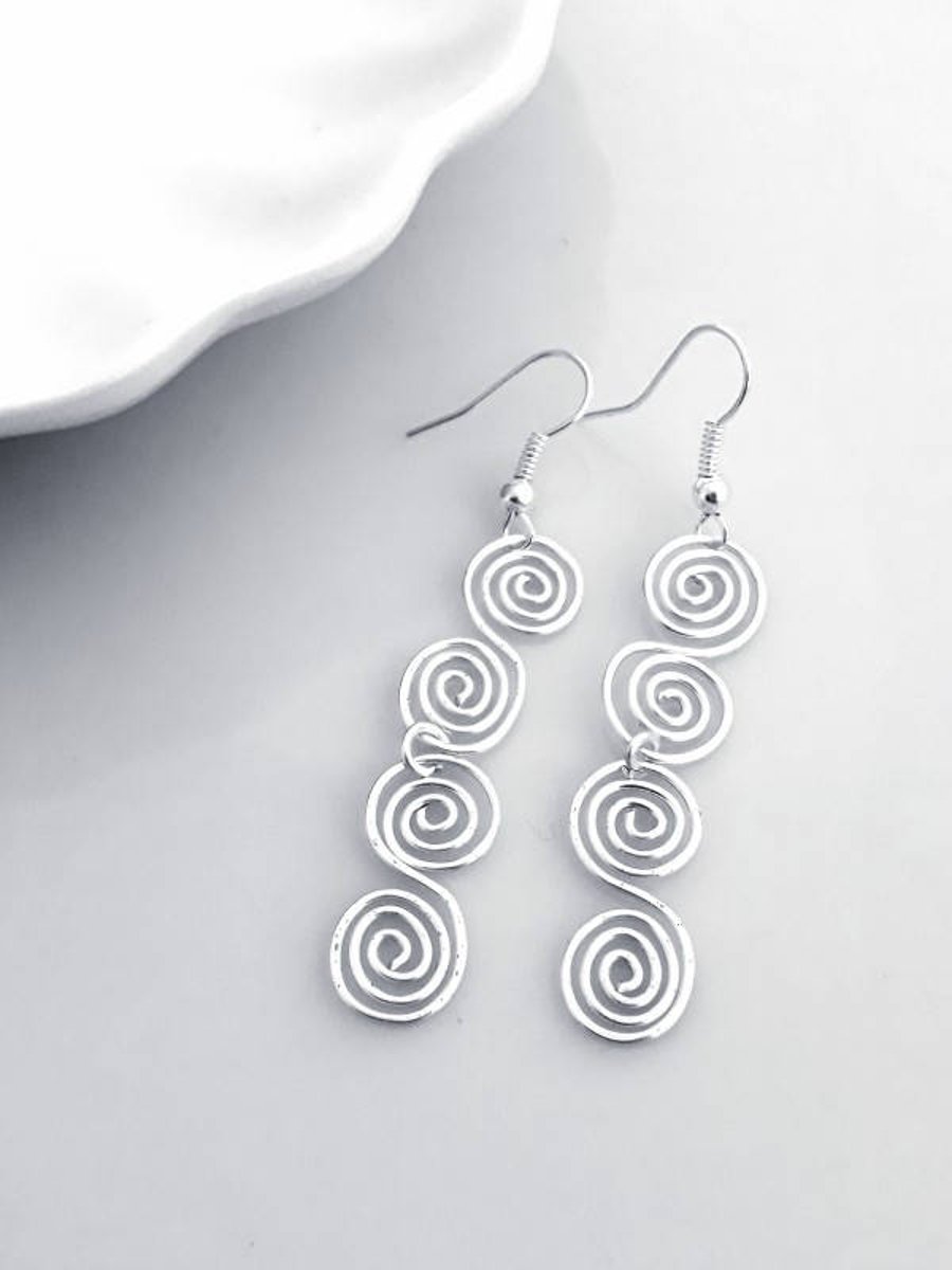 Celtic spiral silver earrings, long dangly earrings