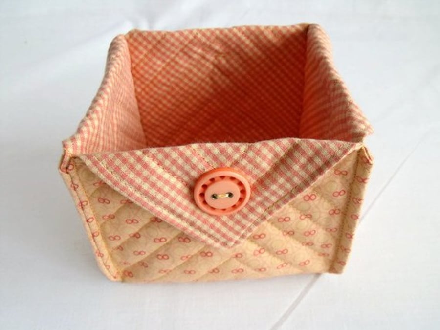  folded fabric storage tub for your bits and bobs, peach