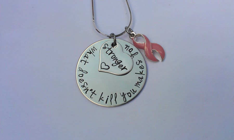 What doesn't kill you makes you stronger awareness ribbon Hand Stamped necklace