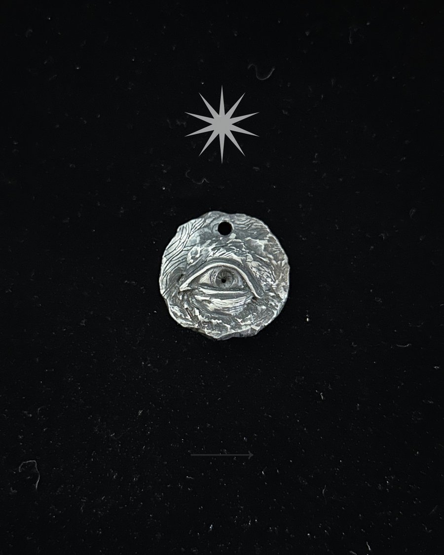 Silver eye medallion charm (no chain)