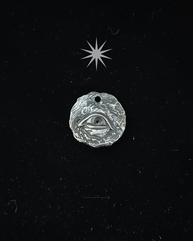 Silver eye medallion charm (no chain)