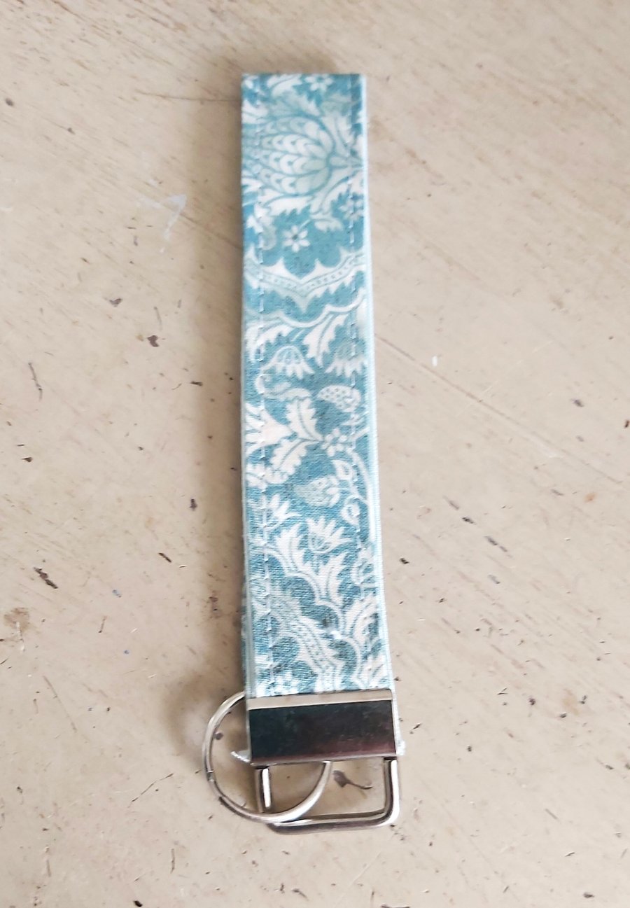 Cheerful wrist band, hanging key fob