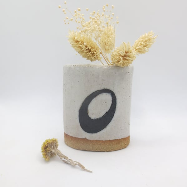 Hand-built small stoneware pottery oval vase in white and black
