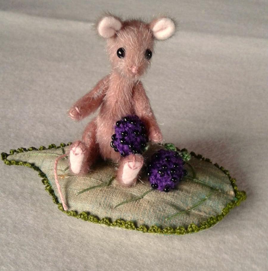 Bramble, a tiny jointed mouse on a silk leaf with beaded blackberries.