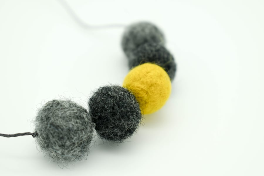 Felted bead necklace in ochre and grey wool