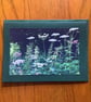 Handmade photo card of cow parsley and nettles.