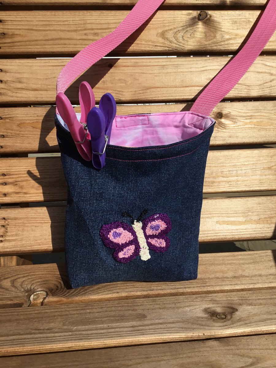 Peg bag with shoulder strap. Recycled denim and embroidered butterfly decoration