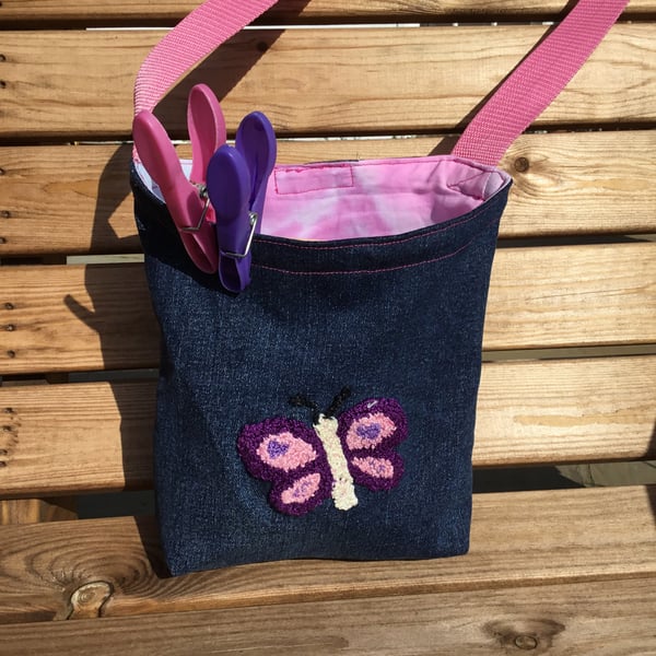 Peg bag with shoulder strap. Recycled denim and embroidered butterfly decoration