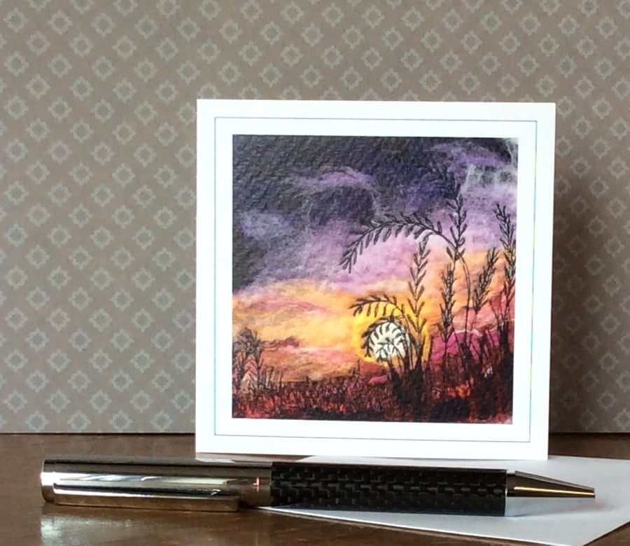Embroidered sunset landscape card. 