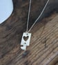 Silver pendant with heart cut out design - Image 2