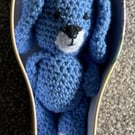 Sleeping rabbit in a tin 