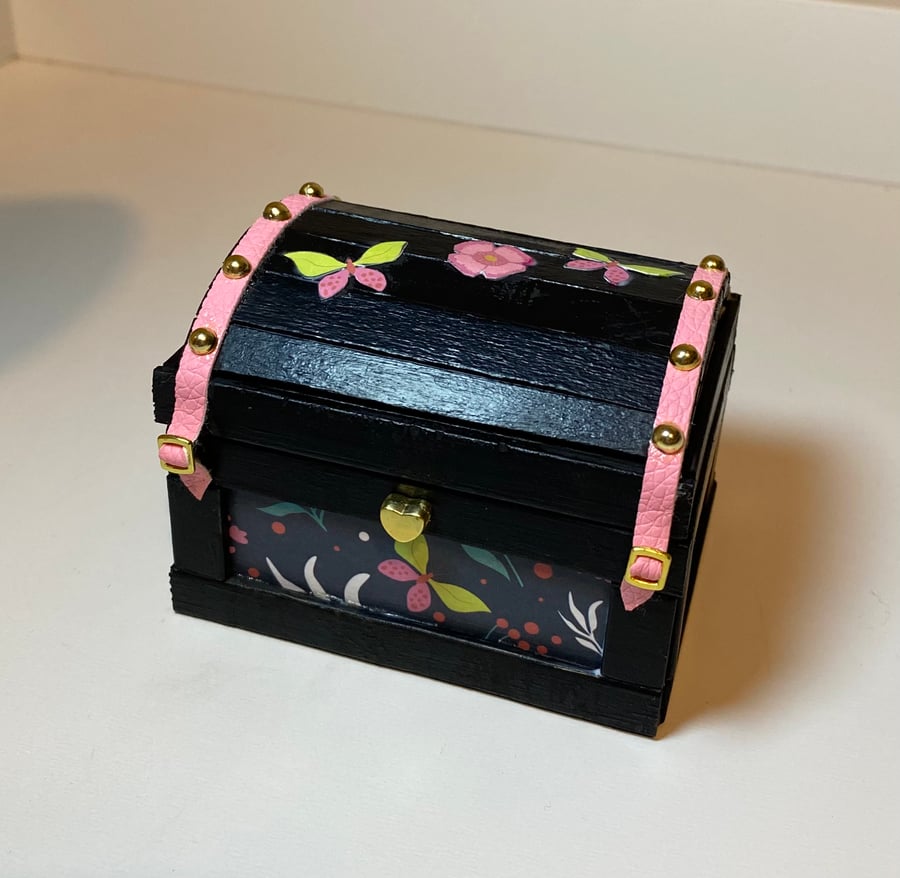 Black Wooden Trunk with Pink Decorative Detailing 
