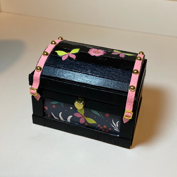 Black Wooden Trunk with Pink Decorative Detailing 