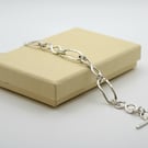 Silver link bracelet knotted and paperclip links