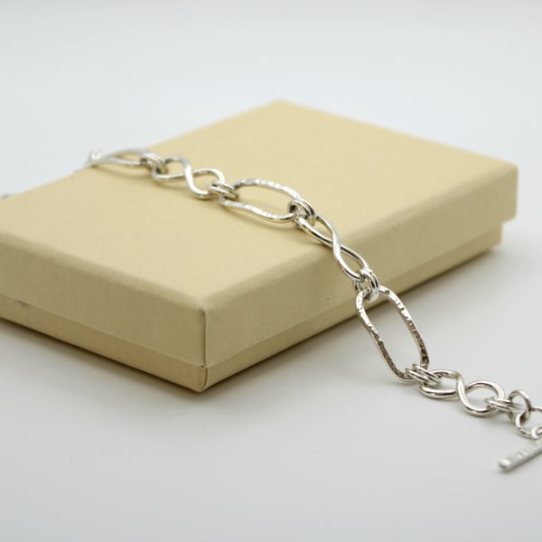 Silver link bracelet knotted and paperclip links