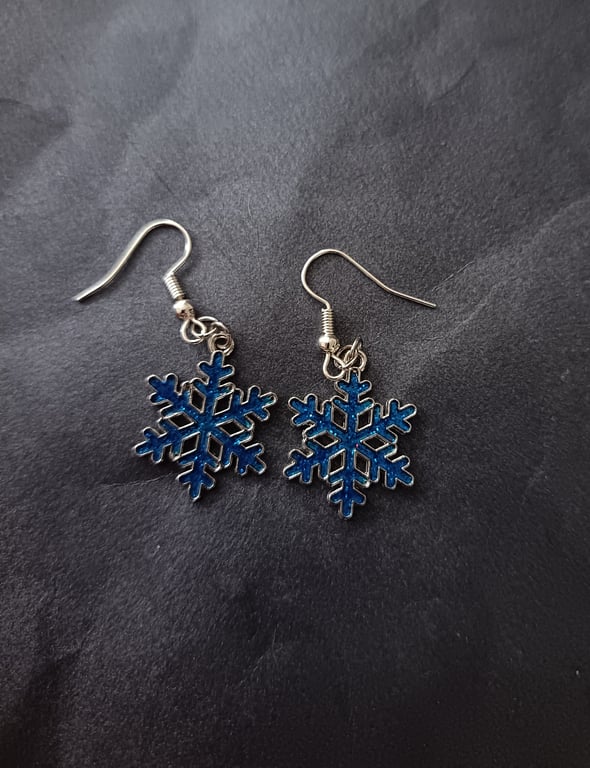 Silver and blue snowflake charm dangle earrings  