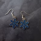 Silver and blue snowflake charm dangle earrings  