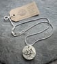 Handmade Ceramic Hare pendant in black white and grey - Image 4