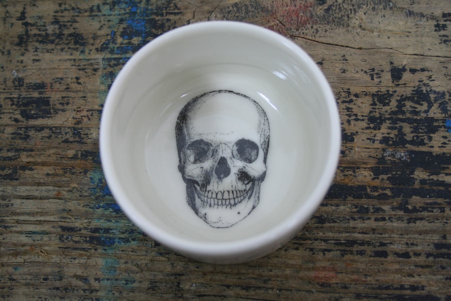 Porcelain dish with skull image