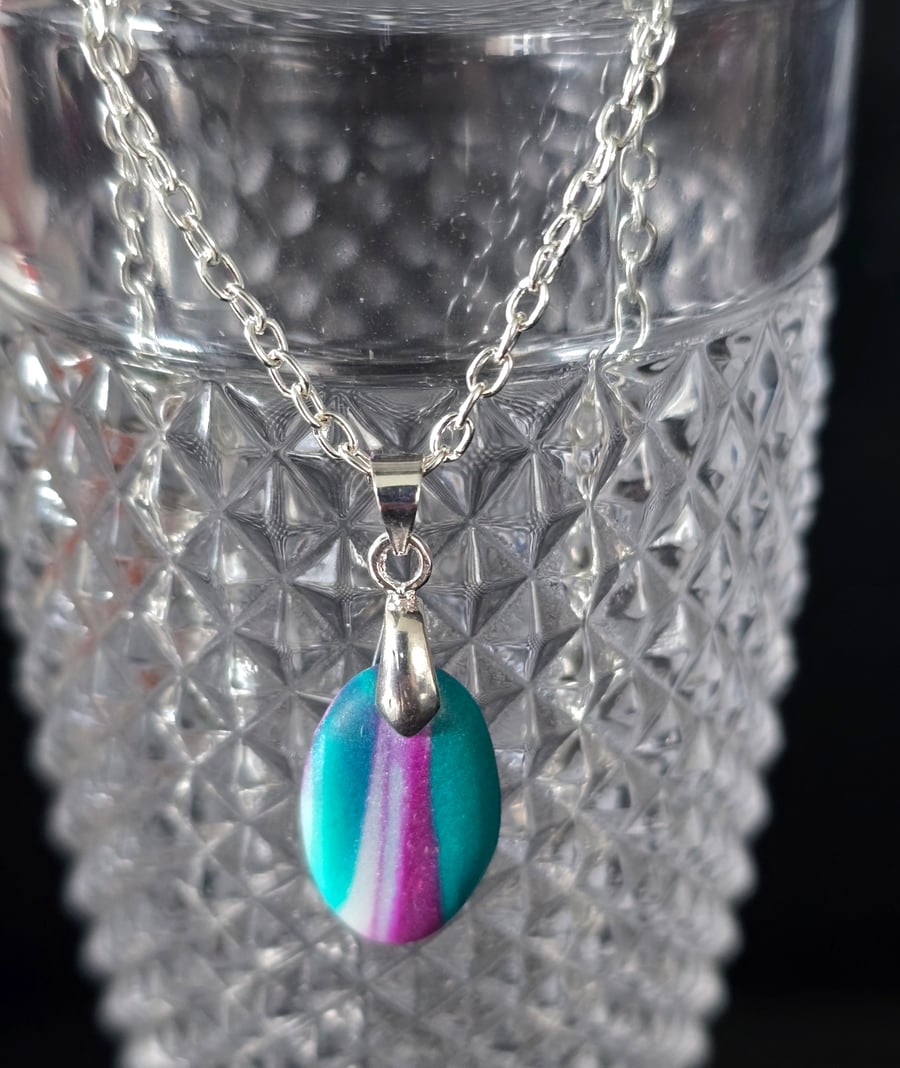 Polymer teal and purple small oval necklace on a silver plated chain
