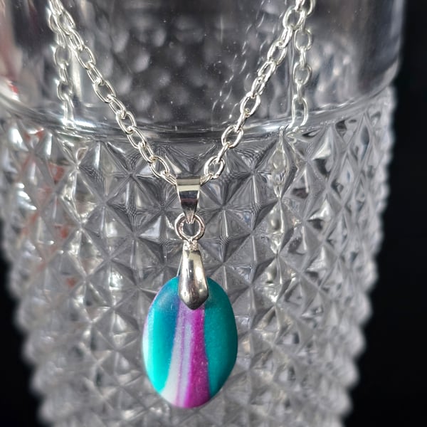 Polymer teal and purple small oval necklace on a silver plated chain
