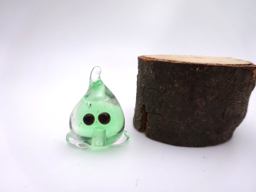 small glass wisp figure