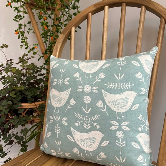 Cushion cover with a Scandi bird and flower print in seafoam, 36cm x 36cm