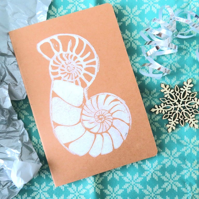 Nautilus spiral hand printed lino A5 notebook - white ink on a brown kraft cover