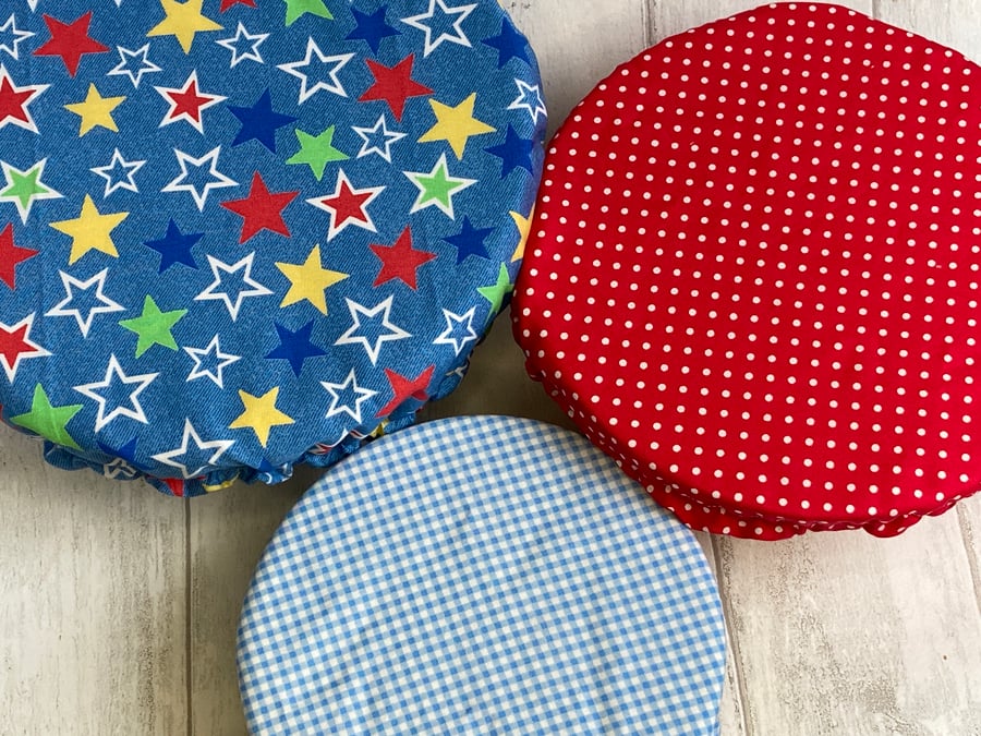Three reusable bowl covers. Stars, spots and checks