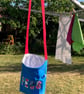 Blue peg bag with red shoulder strap.  - Image 4