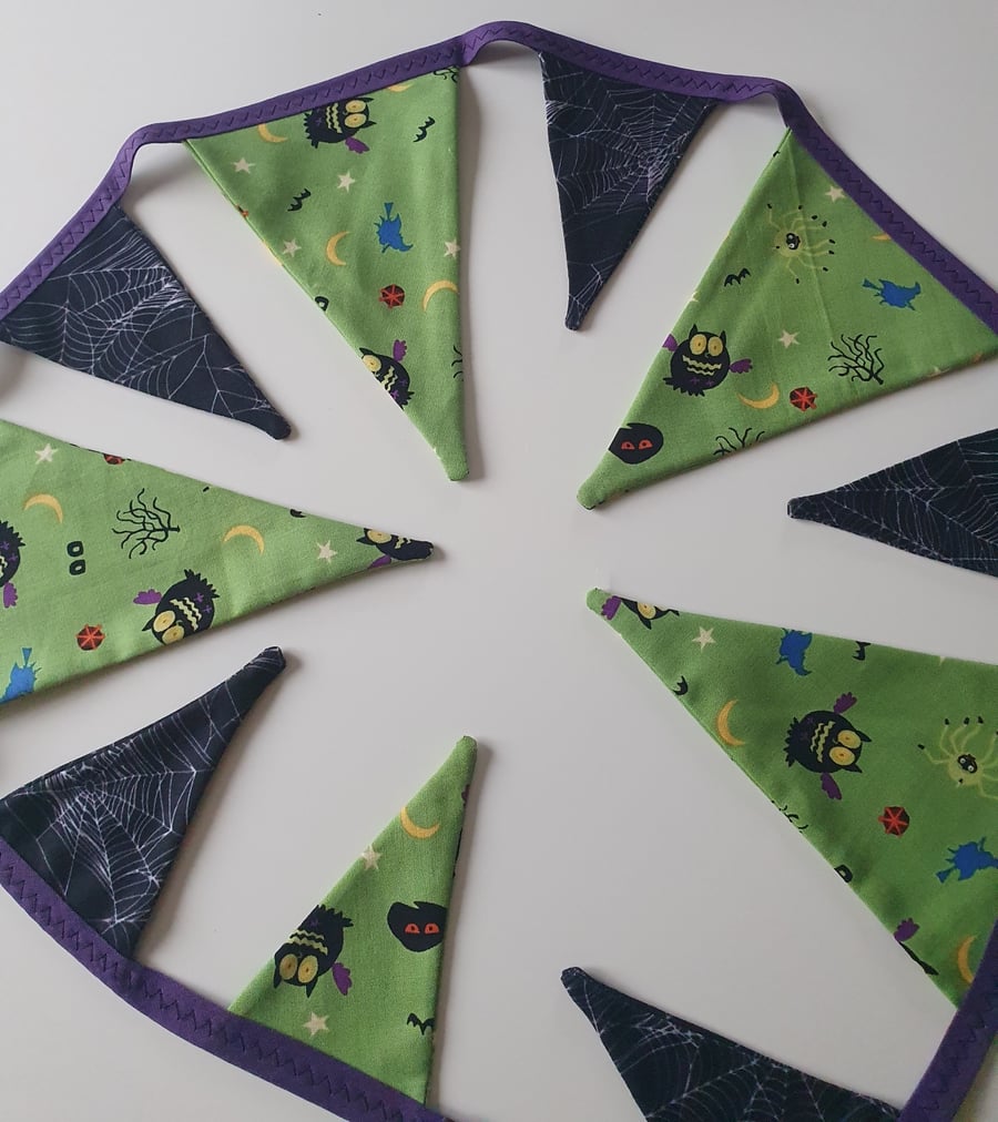 Green and Black Cobwebs and Owls Bunting on Purple Binding