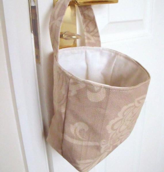 door handle storage bag or gear stick bag, beige floral fabric