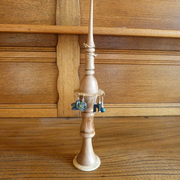 A finialed ring box and earring stand.