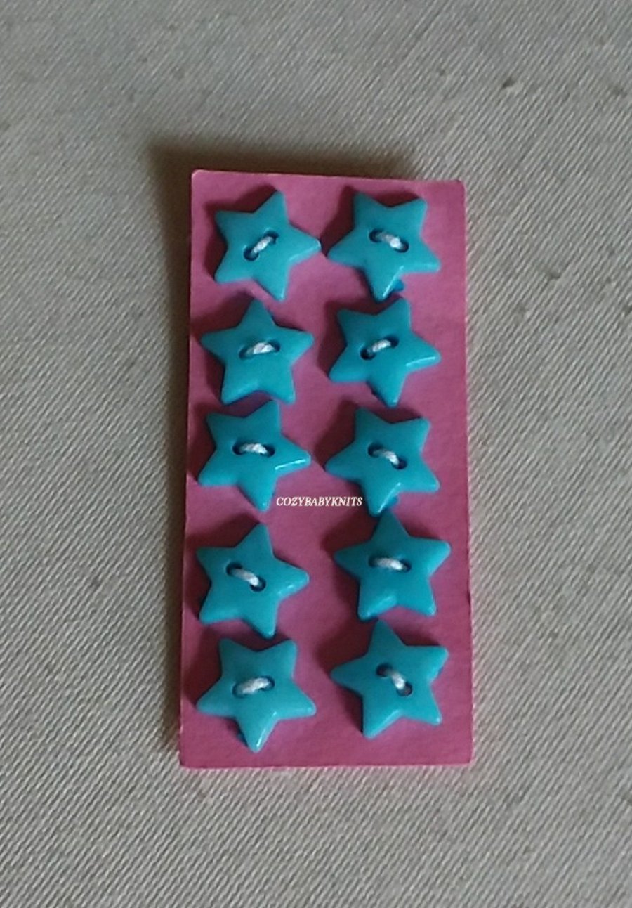 Pale blue star buttons