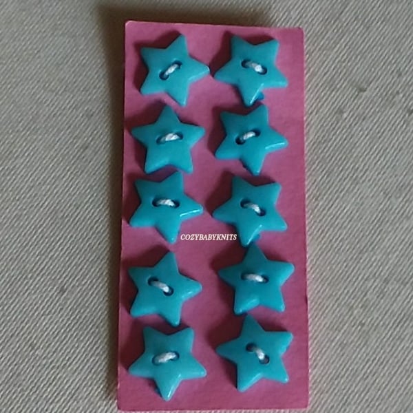 Pale blue star buttons