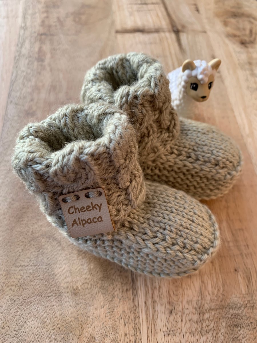 Hand knitted baby booties. Folksy