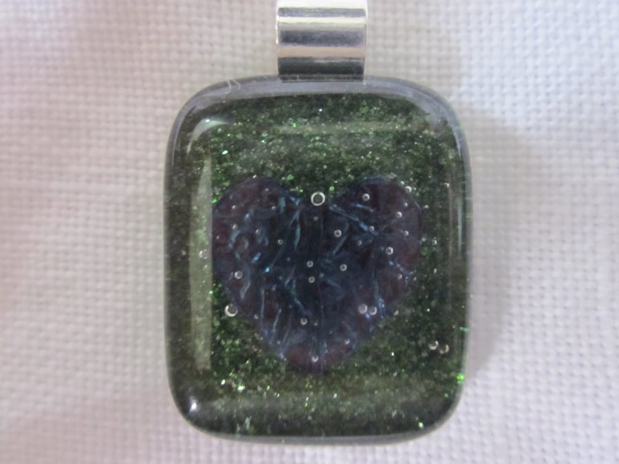 Handmade fused glass copper inclusion pendant - emerald dichroic with heart
