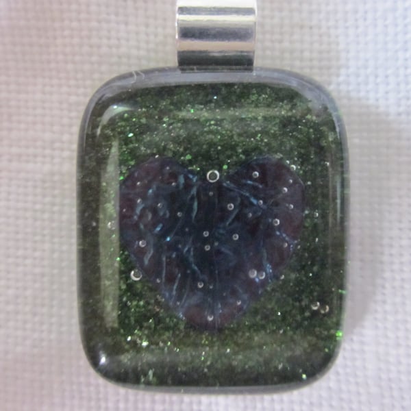 Handmade fused glass copper inclusion pendant - emerald dichroic with heart