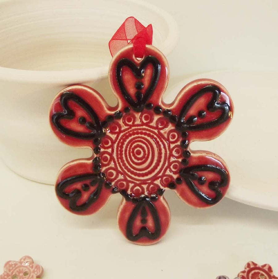 Sale Bright ceramic flower decoration.