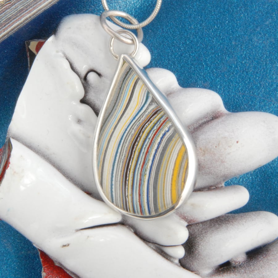 Retro Dagenham fordite and silver pendant