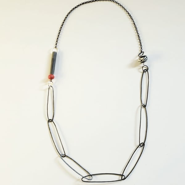 Unusual silver, black and red quirky chain necklace