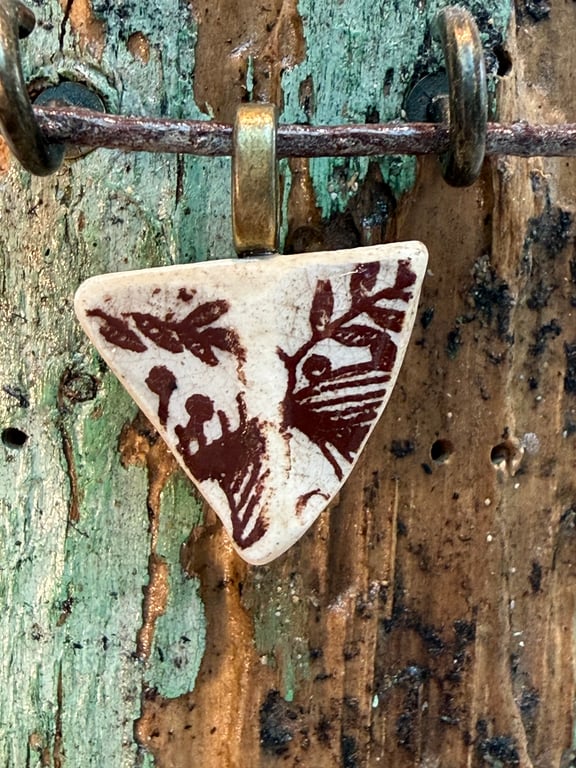 Small triangular brown sea pottery pendant 